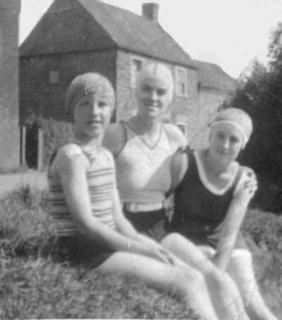 Mother & sisters by the pond